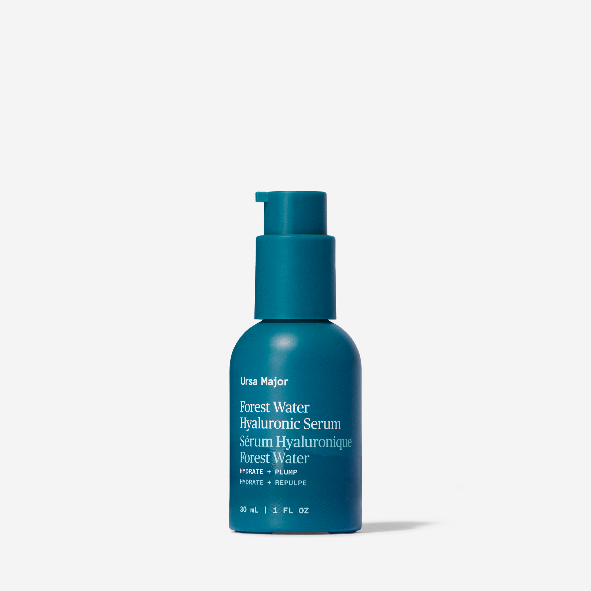 Blue skincare serum bottle on a white background