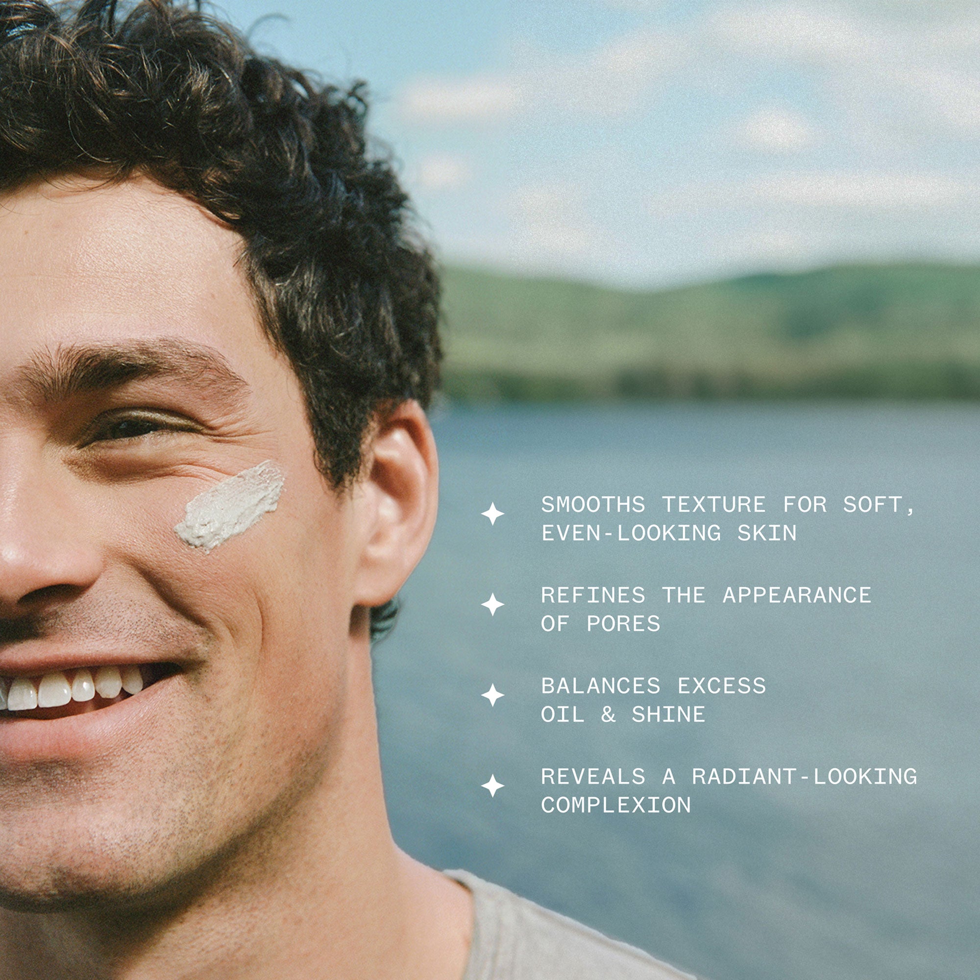 Man with mineral polish on his face, with a scenic background