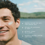 Man with mineral polish on his face, with a scenic background