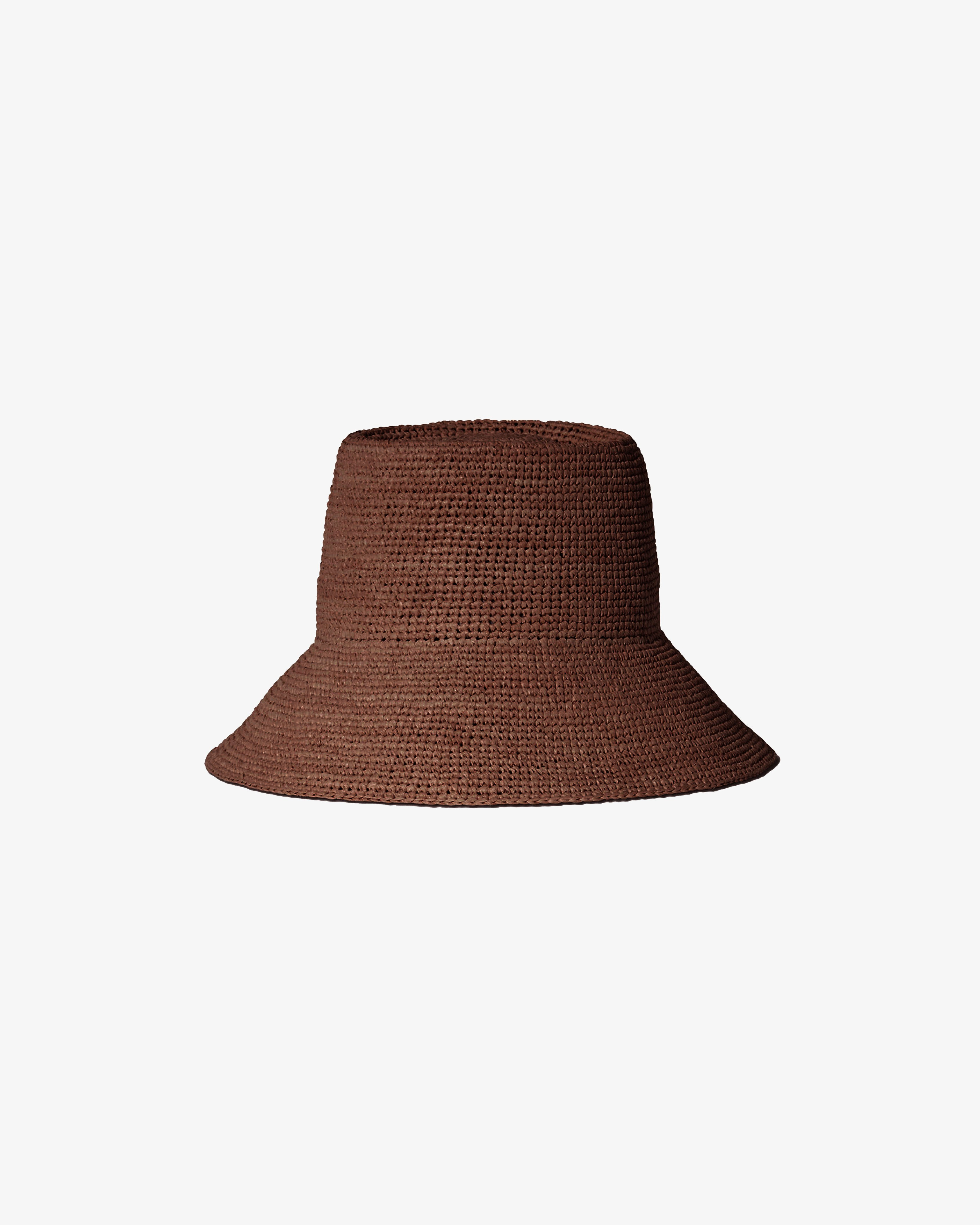 Brown raffia bucket hat on a white background